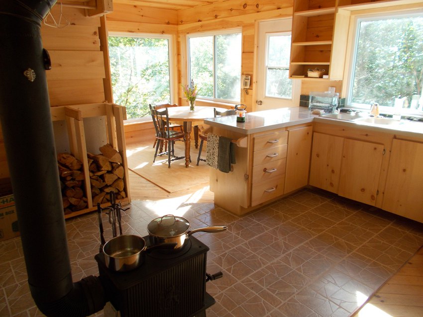 Sunshine from several windows lights the open concept living space